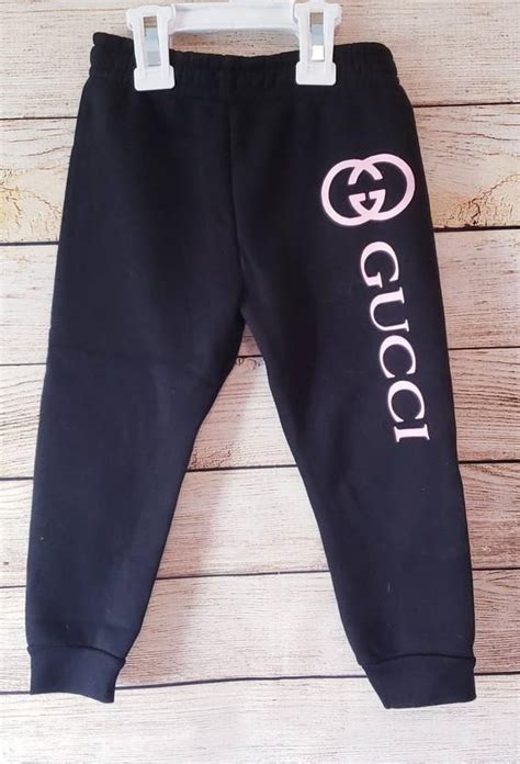 girls black gucci sweat poants|Gucci girls sweatshirt.